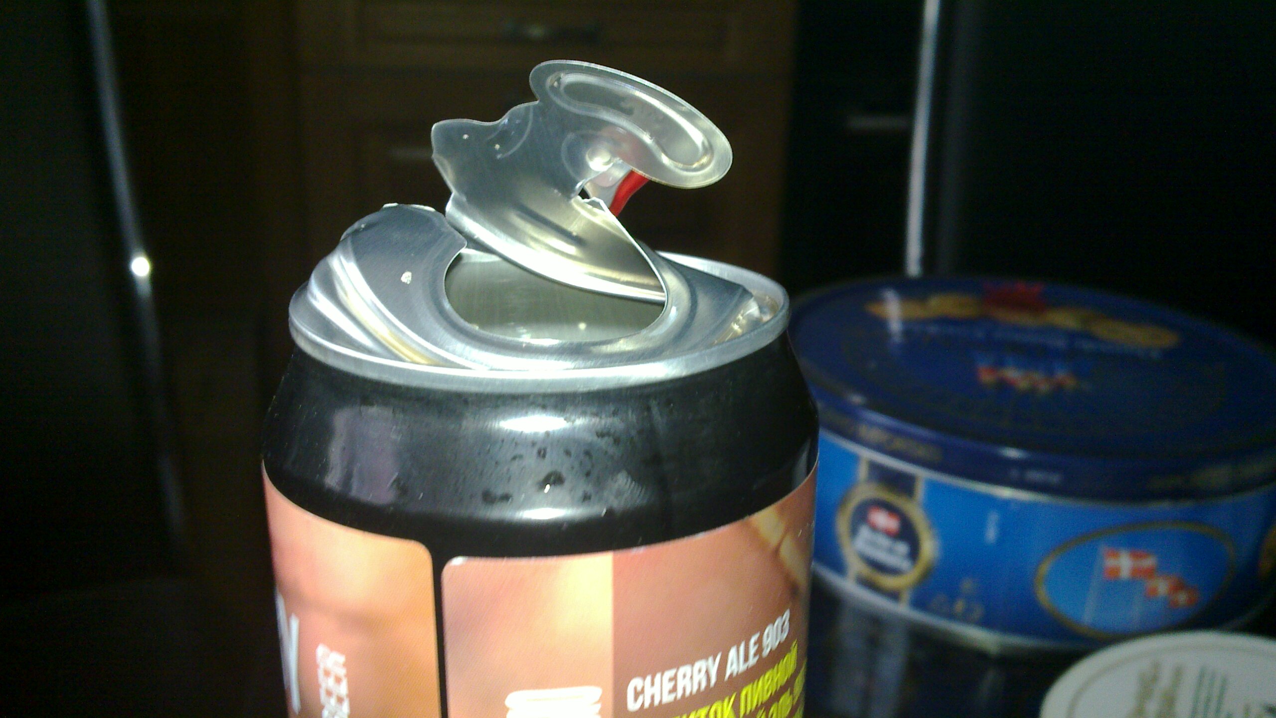 [IMG: Side view of red-tabbed splodey can]