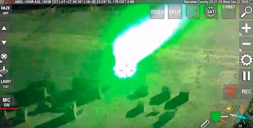 [IMG: A laser strike, as seen from the helicopter]