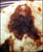 [IMG: Jesus on a chapati]